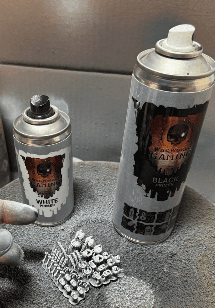 Two cans of spray paint