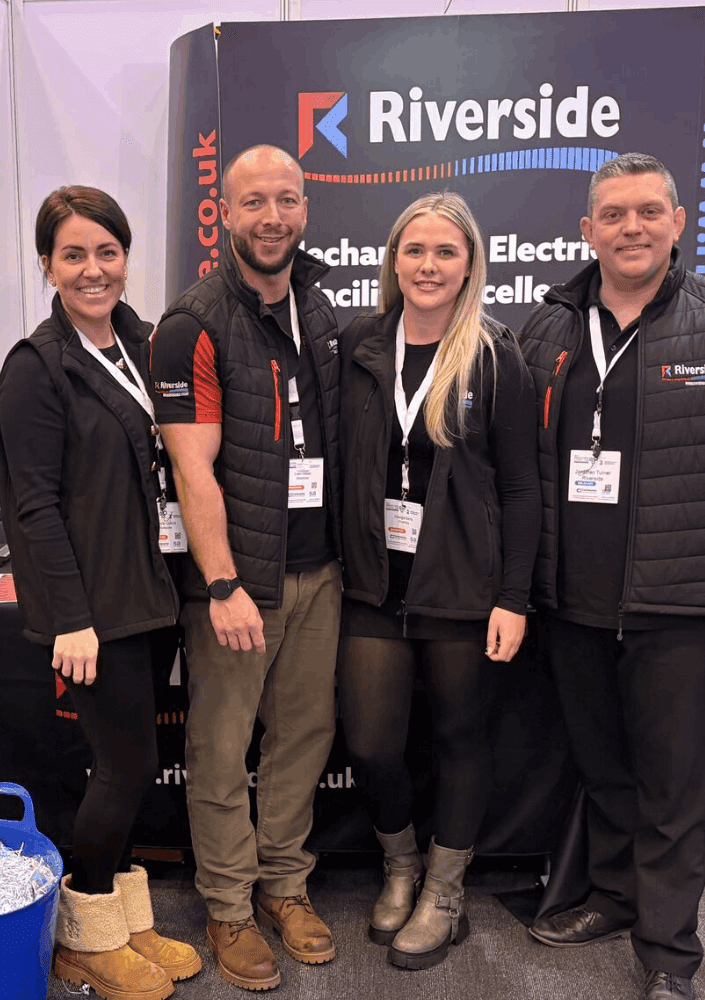 Natalie and Georgia from Creative Collins standing with two members from Riverside